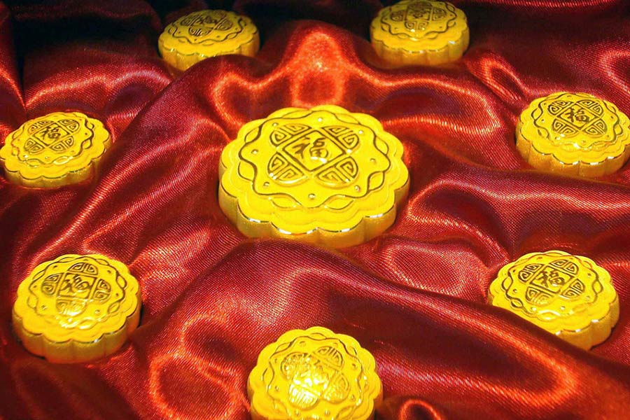 Gold and silver mooncakes look more alluring than real ones