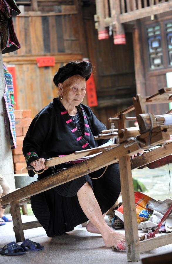 Weaving profits, tradition with hand-made dresses