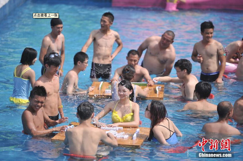 Beating the heat with mahjong, water fights and massage