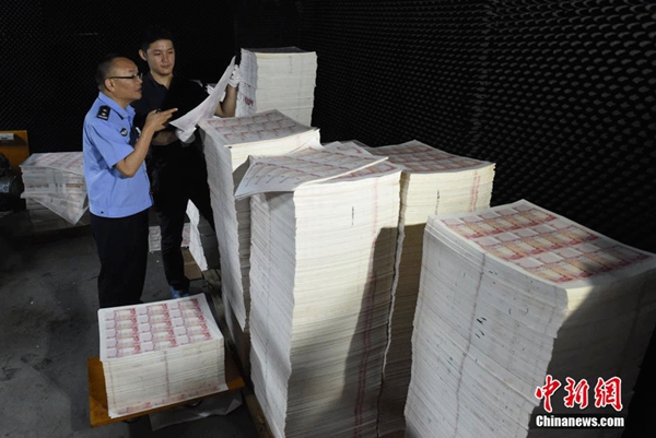 Guangdong busts major counterfeit banknote factories