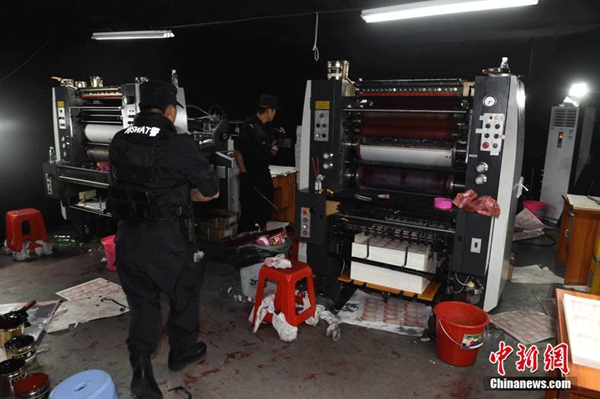 Guangdong busts major counterfeit banknote factories