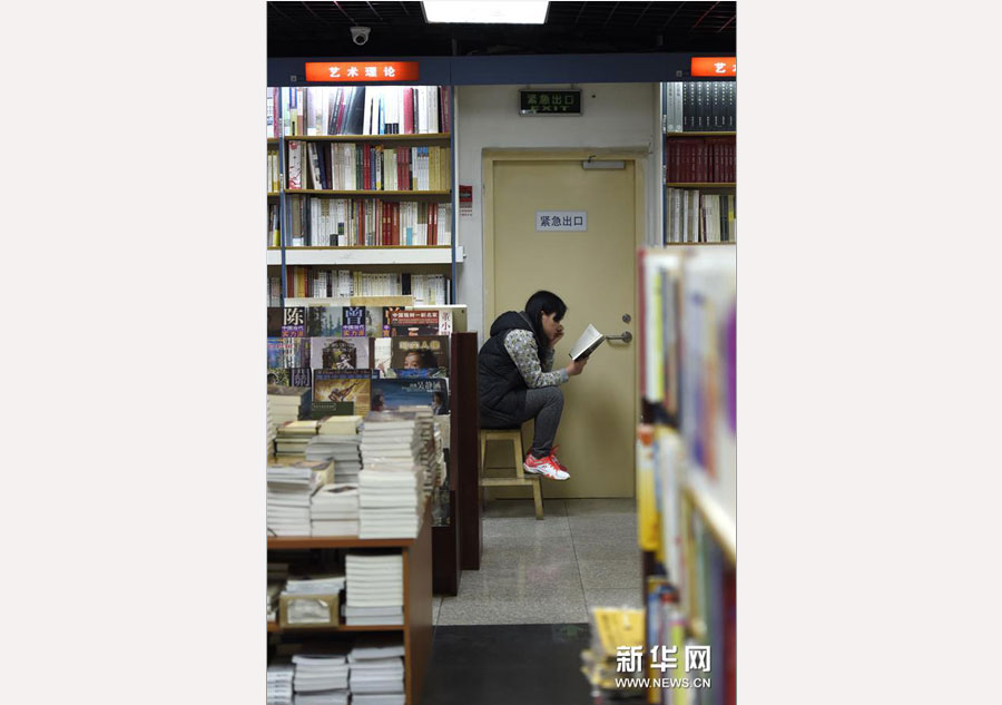 Readers at a 24-hour bookstore in Beijing