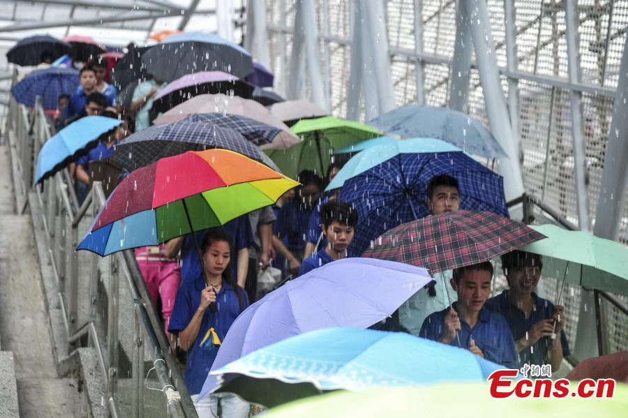 Sports venue turns makeshift shelters as Typhoon Nida lashes Shenzhen