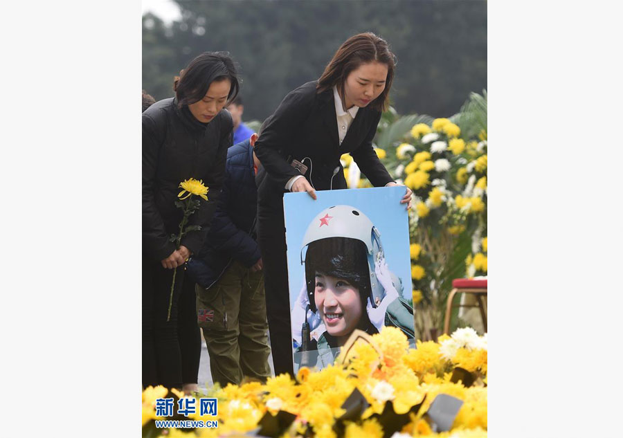 Ashes of fallen pilot placed in hometown cemetery