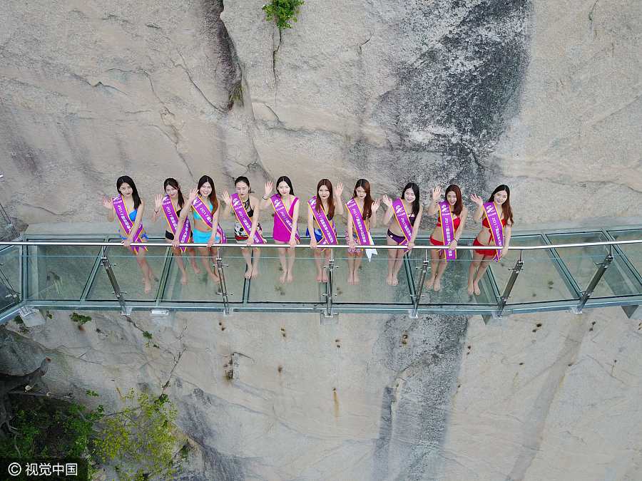 Models catwalk in bikini on 1,000-meter-high mountainside