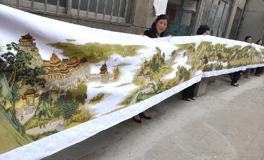 Cross-stitch work of 'Riverside Scene at the Qingming Festival'