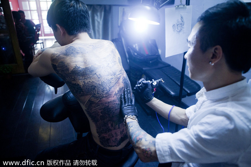 Legendary painting tattooed on man's back