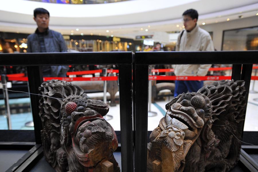 Exhibition of ancient Chinese architectural woodcarving components kicks off in Jinan