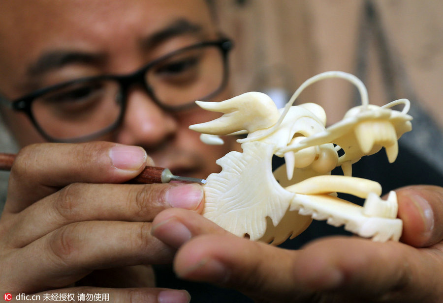 Bone sculpture: A centipede kite with dragon head