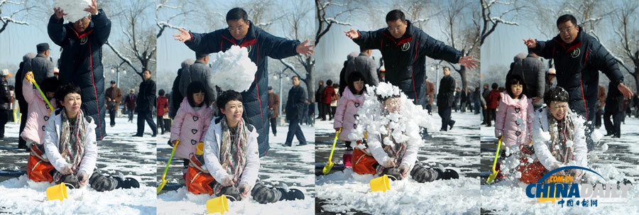 北京春分迎強降雪 頤和園游人“雪戰”