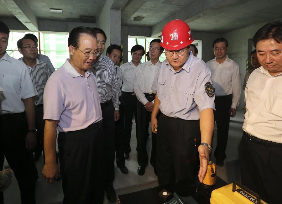 溫家寶:投入市場、群眾滿意是衡量保障性安居工程進展好壞最重要的標準