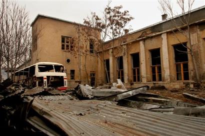 Back view of the old Afghan Parliament that was heavily damaged during the civil war, and is now under reconstruction, Kabul, Sunday, March 20, 2005. Afghanistan (news - web sites) will hold its delayed parliamentary elections on September 18, a joint Afghan-United Nations (news - web sites) election commission said today. (AP Photo/Tomas Munita) 