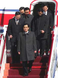 North Korean Premier Pak Bong Ju, center, arrives at Beijing airport Tuesday March 22, 2005. Pak arrived for a six day visit to China, and is expected to visit both Shanghai and the northeastern city of Shenyang. (AP