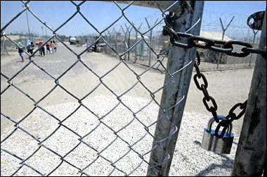 A lock on a prison gate in Iraq. Prisoners at a US-run detention camp in southern Iraq rioted on April 1, the International Committee of the Red Cross (ICRC) confirmed following a denial of the incident by the US military.(AFP/File/Karim Sahib) 