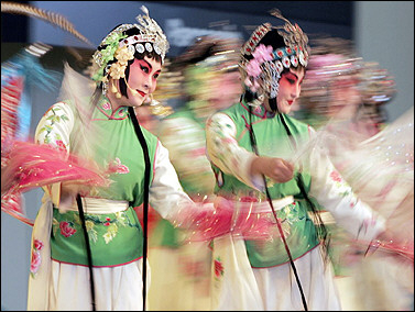 Chinese actresses perform a traditional Chinese opera during the Chinese national day official ceremony in the 2005 Aichi World Expo in Nagakute, japan. The first World Exposition of the 21st century closes its doors this weekend(AFP/File