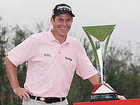 david howell poses with the champions's cup