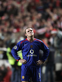 anchester United's Wayne Rooney reacts after losing to Benfica