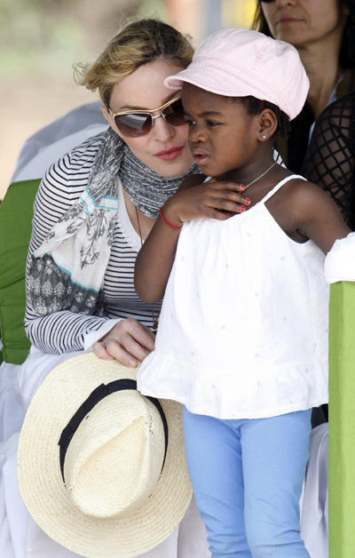 Madonna and her adopted child at site of her Raising Malawi Girls Academy