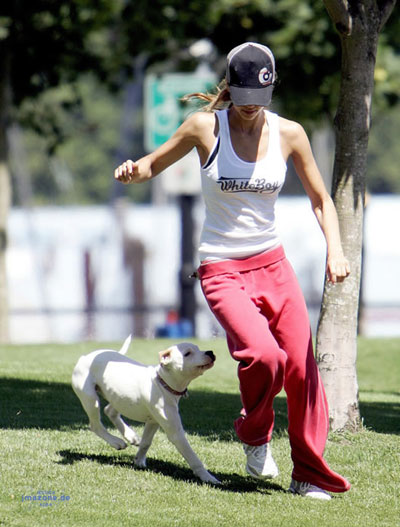 Jessica Alba plays with her dog