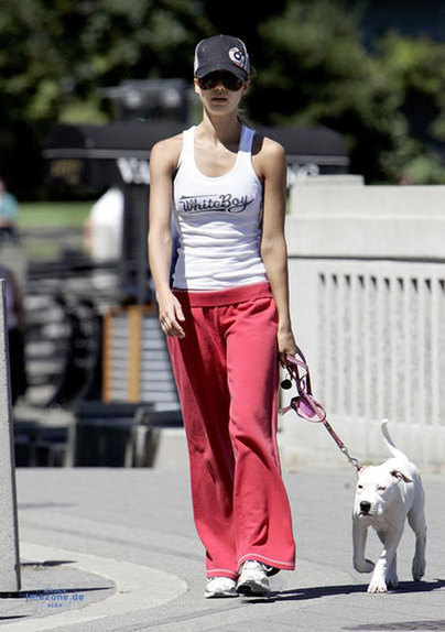 Jessica Alba plays with her dog