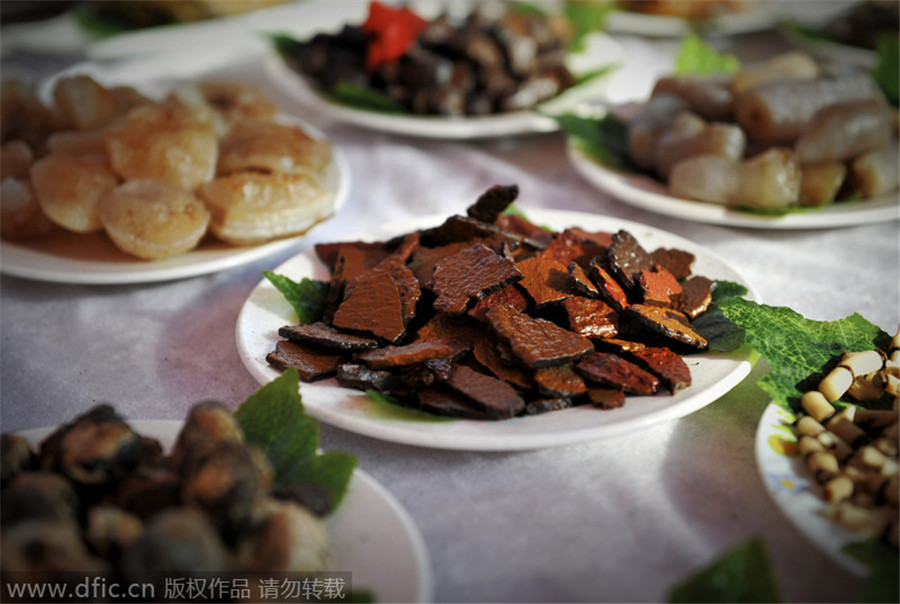 Stone-made banquet on display in S China