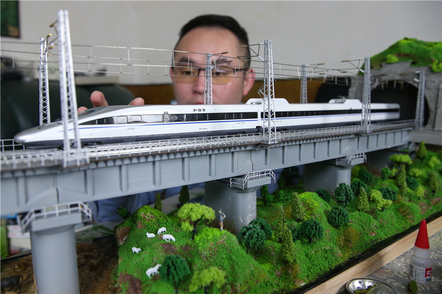 Railway conductor builds lifelike train models