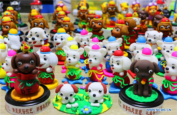 Chinese artist makes 2018 pieces of doggie dough figurines ahead of New Year