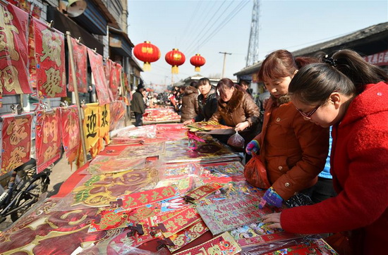 People prepare for the coming Spring Festival