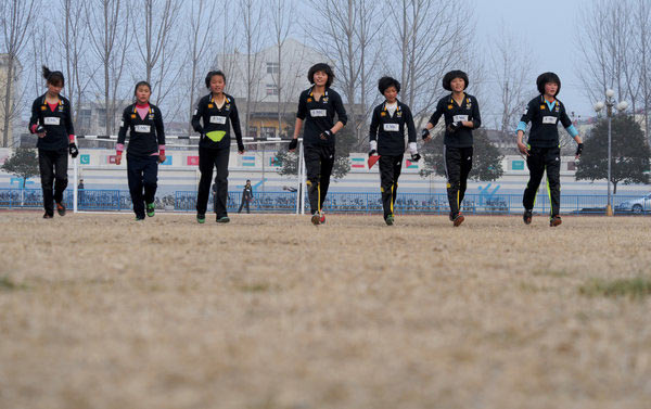 Female rugby team trains for '14 Youth Olympics