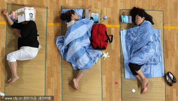 Parents sleep on floors in display of love