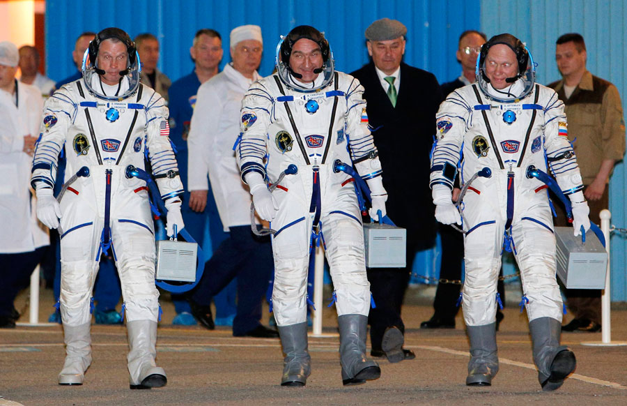 Russian-US crew blast off for space station