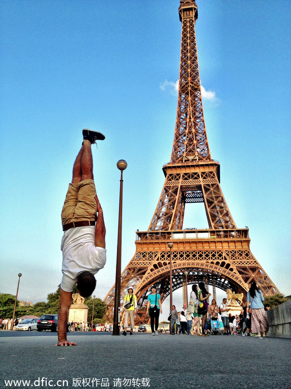 Breakdancer 'freezes' in front of Paris landmarks