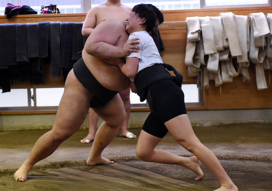 Japan's women wrestlers take on sumo's big boys