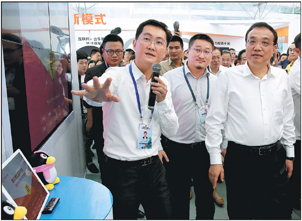 Li vows anew to ease market access