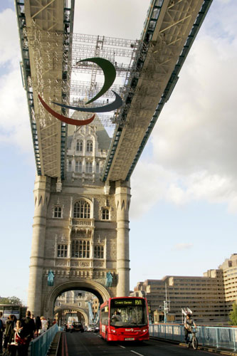 Paralympics logo hangs on Tower Bridge in London