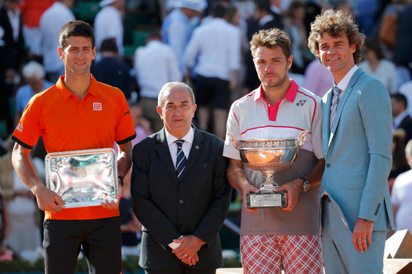 Inspired Wawrinka tames Djokovic to win French Open