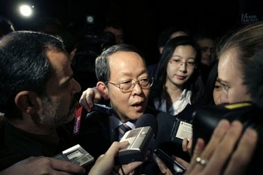 The Chinese Ambassador to the United Nations Wang Guangya leaves a meeting, Thursday, Dec. 21, 2006. The permanent members of the security council and the German ambassador were meeting to discuss Iran; the meeting was suspended with no conclusions reached. (AP Photo/Seth Wenig) 