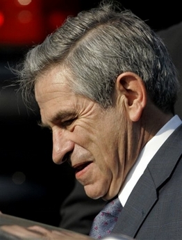 World Bank President Paul Wolfowitz departs his home in Chevy Chase, Md., Wednesday, May 16, 2007. Wolfowitz, who is accused by a special bank panel of breaking conflict-of-interest rules, maintains that he acted in good faith in arranging a generous pay package for his girlfriend. He waged a vigorous fight to keep running the institution, defending himself before the board in an appearance late Tuesday. (AP Photo/J. Scott Applewhite) 