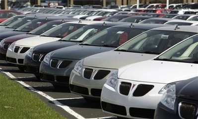 GM to cut 21,000 US factory jobs, shed Pontiac