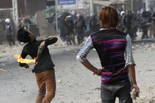 Cambodian police fire on strikers, killing 2