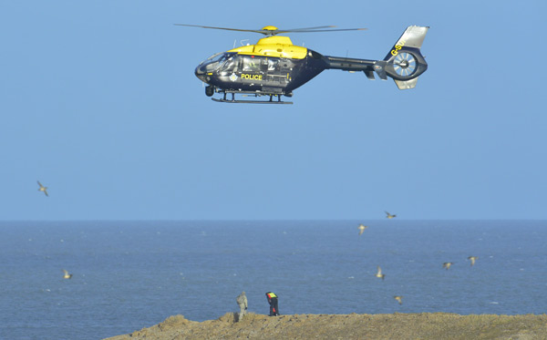 UK police pick through US helicopter crash site