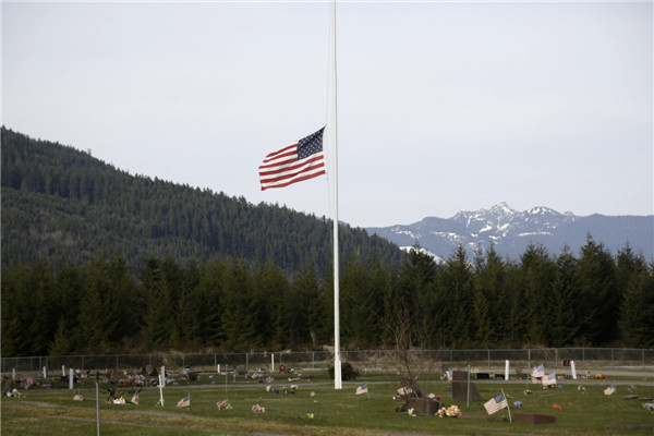 US mudslide death toll climbs to 14, 176 missing