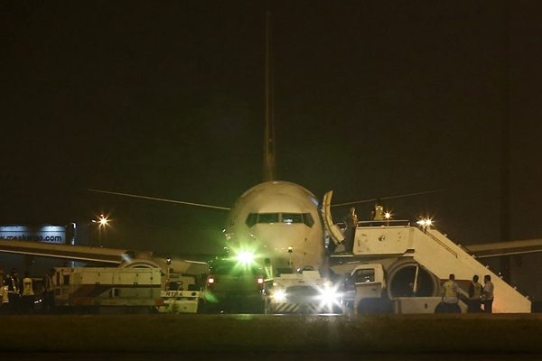 Malaysia Airlines jet turns back after tire burst