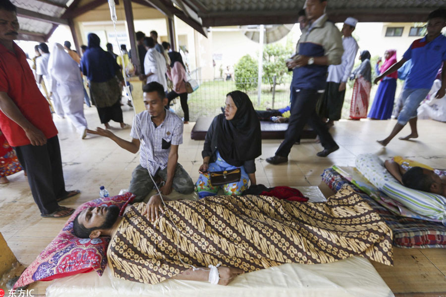 Nearly 100 killed, hundreds hurt as quake strikes Indonesia